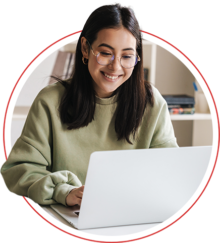 woman smiling at a laptop