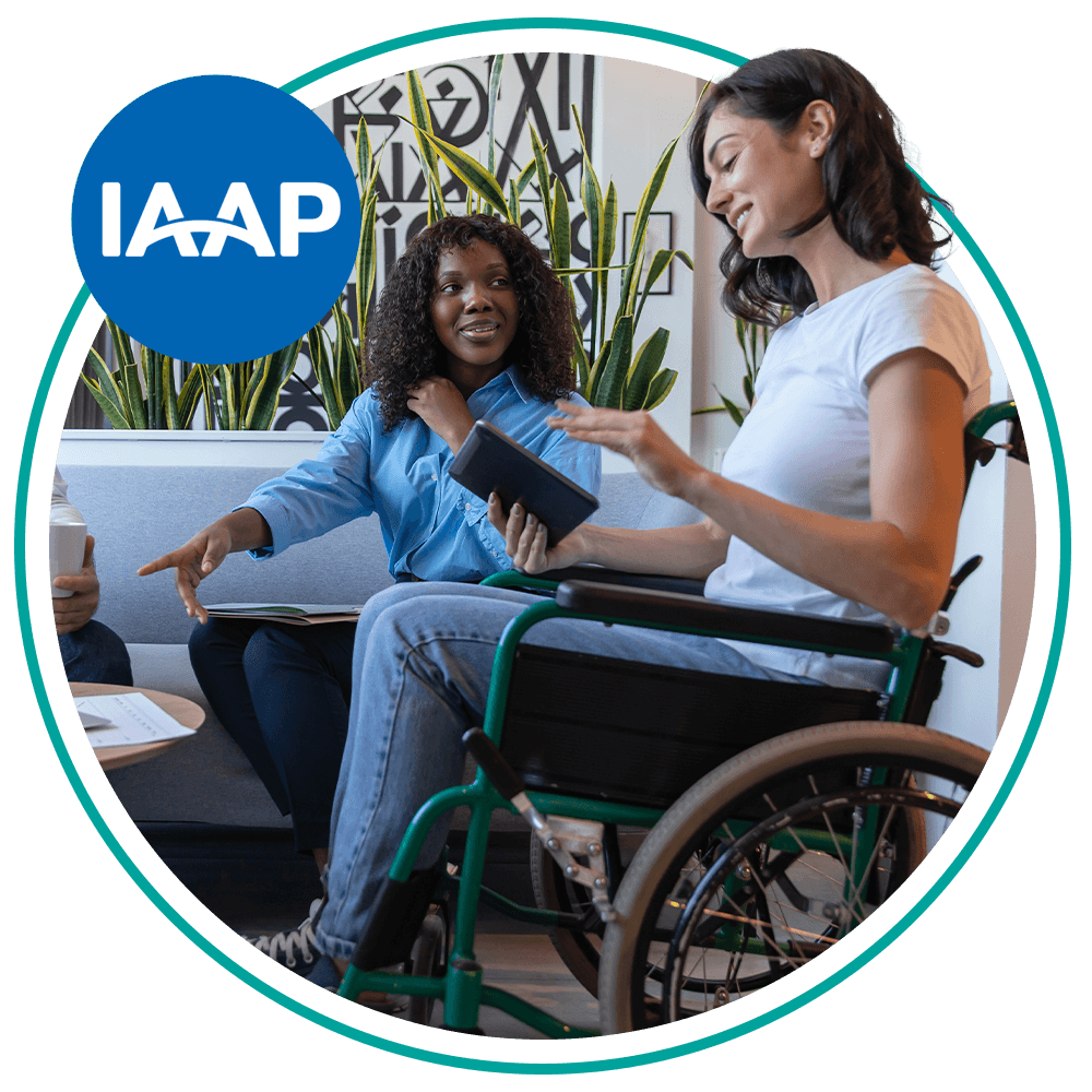 Header image shows person in a wheelchair using a tablet and talking to another person.
