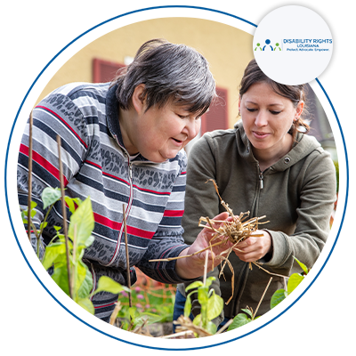 Image of a caregiver helping a woman in the garden