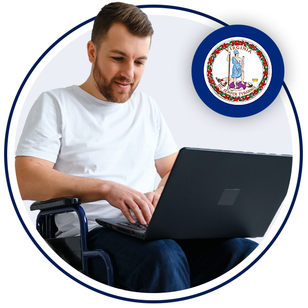 disabled man looking at laptop