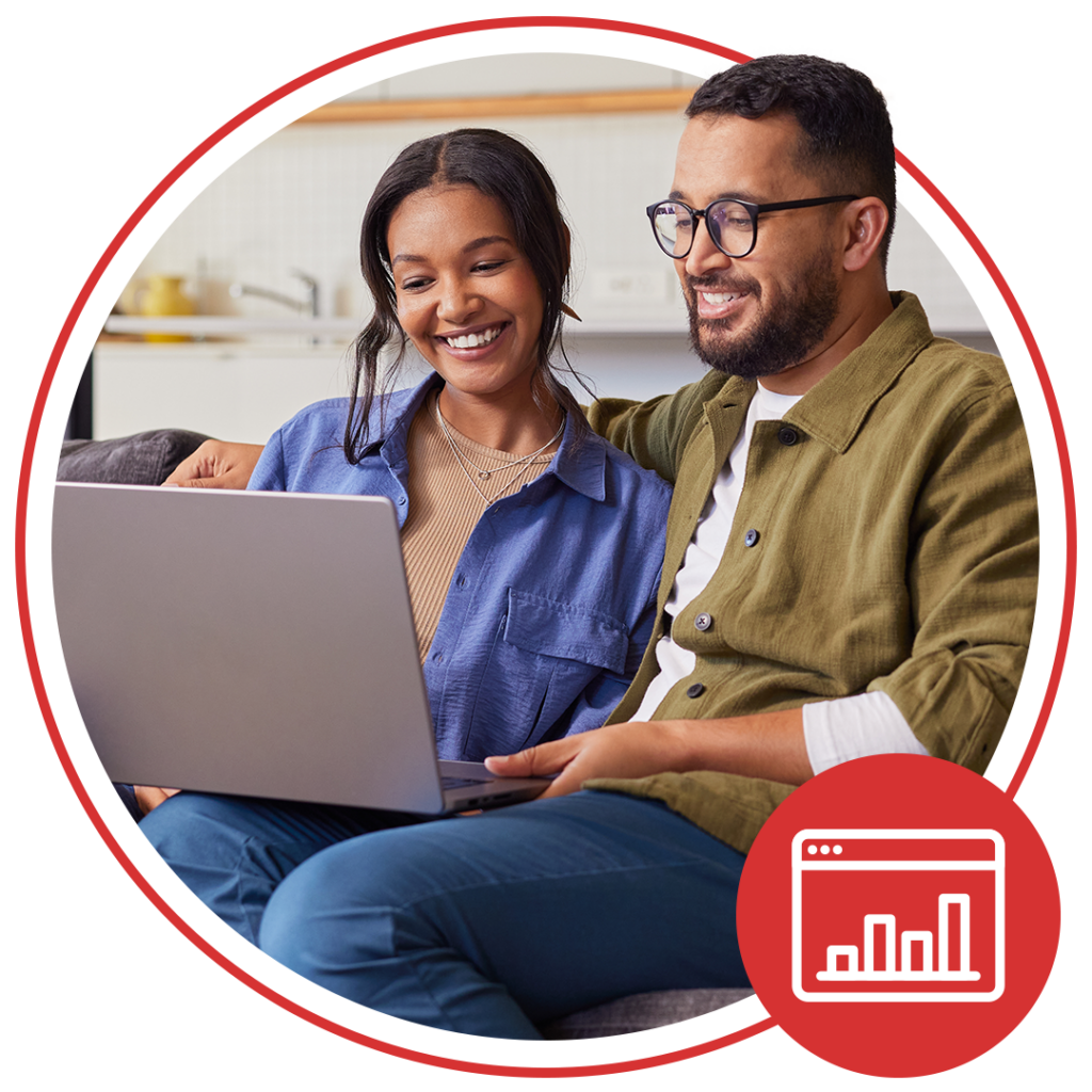 woman and man sitting at laptop