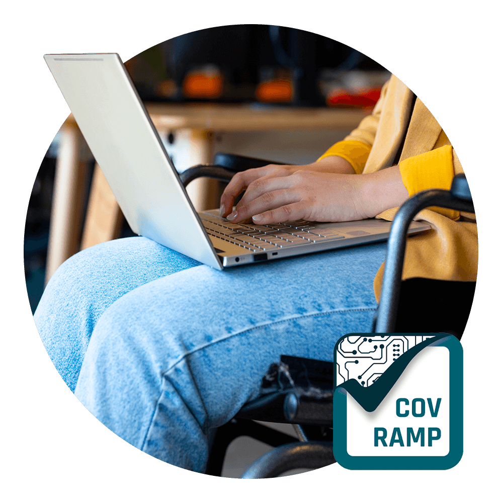 Image of a person sitting down with a laptop in their lap. There is a COV RAMP logo in the bottom right corner
