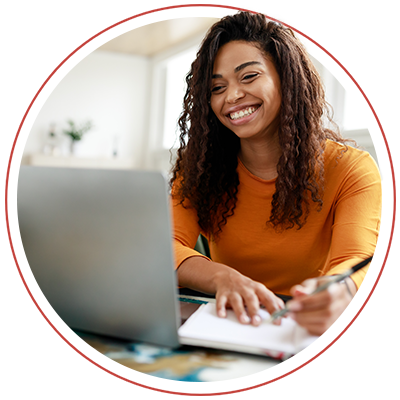 smiling woman at laptop