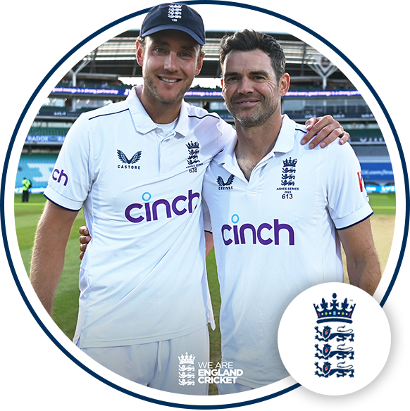 Two cricket players smiling at camera