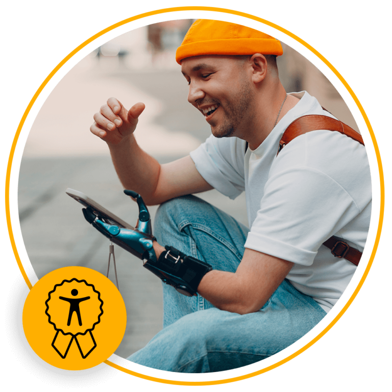 man smiling and using tablet