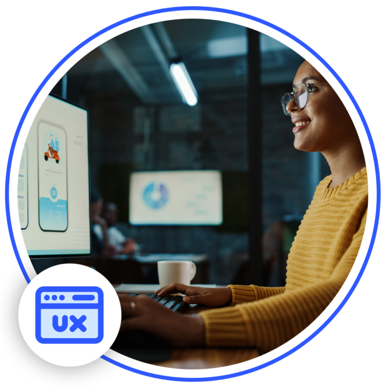 woman sitting at desk using computer