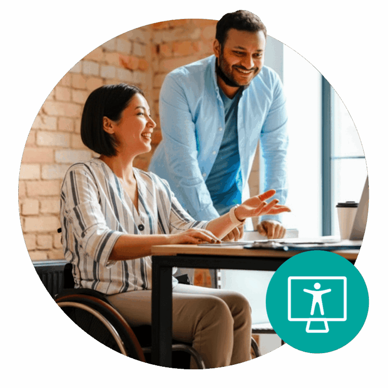 Woman in a wheelchair talking with a colleague about their website